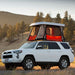 Badass Tents "CONVOY" Toyota 4Runner 09-23' (5th Gen) Rooftop Tent - PRE-ASSEMBLED. Side view of Open tent on vehicle in field