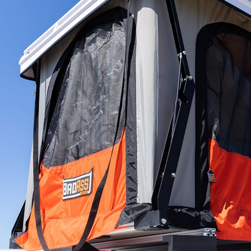 Badass Tents "CONVOY" 2020-23 Land Rover NEW Defender 110 Rooftop Tent PRE-ASSEMBLED. Close up of door on open tent on vehicle