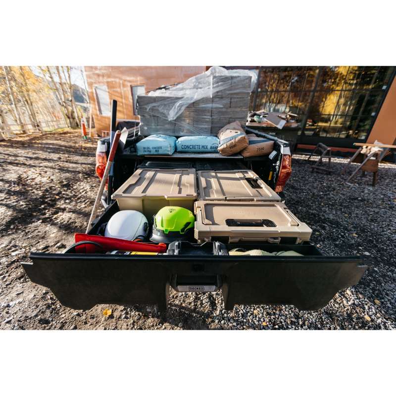 DECKED Truck Bed Drawer System for Jeep Gladiator open drawer with bins installed in truck outdoors rear view