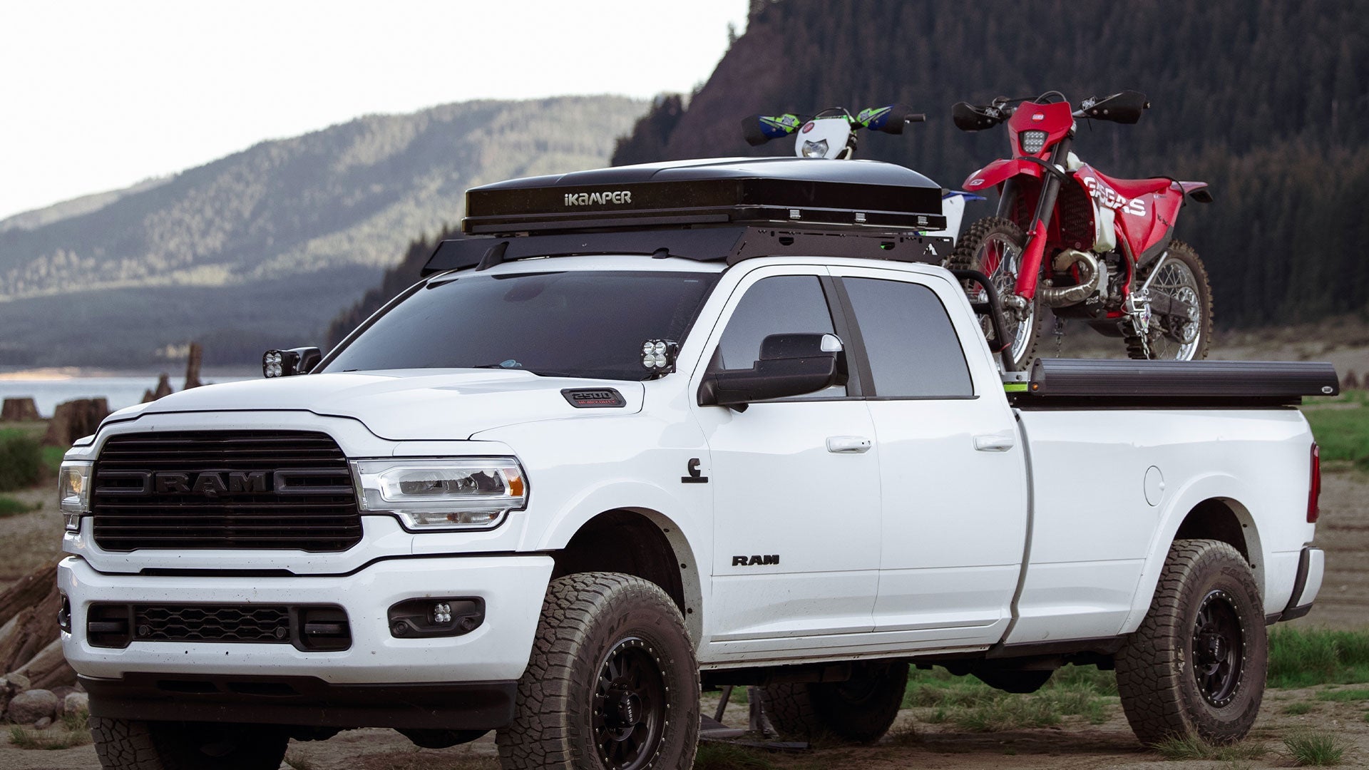 Ultimate Moto Hauler Ram Truck front corner view with equipment on rack