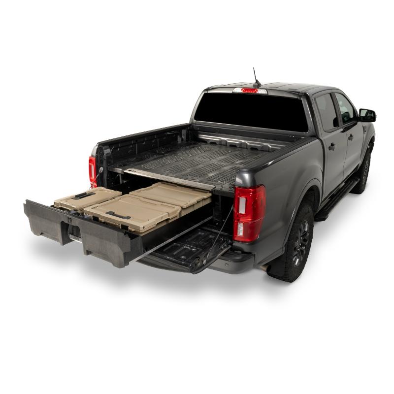 DECKED Truck Bed Drawer System for Nissan Trucks open drawer with bins installed in truck  on white background