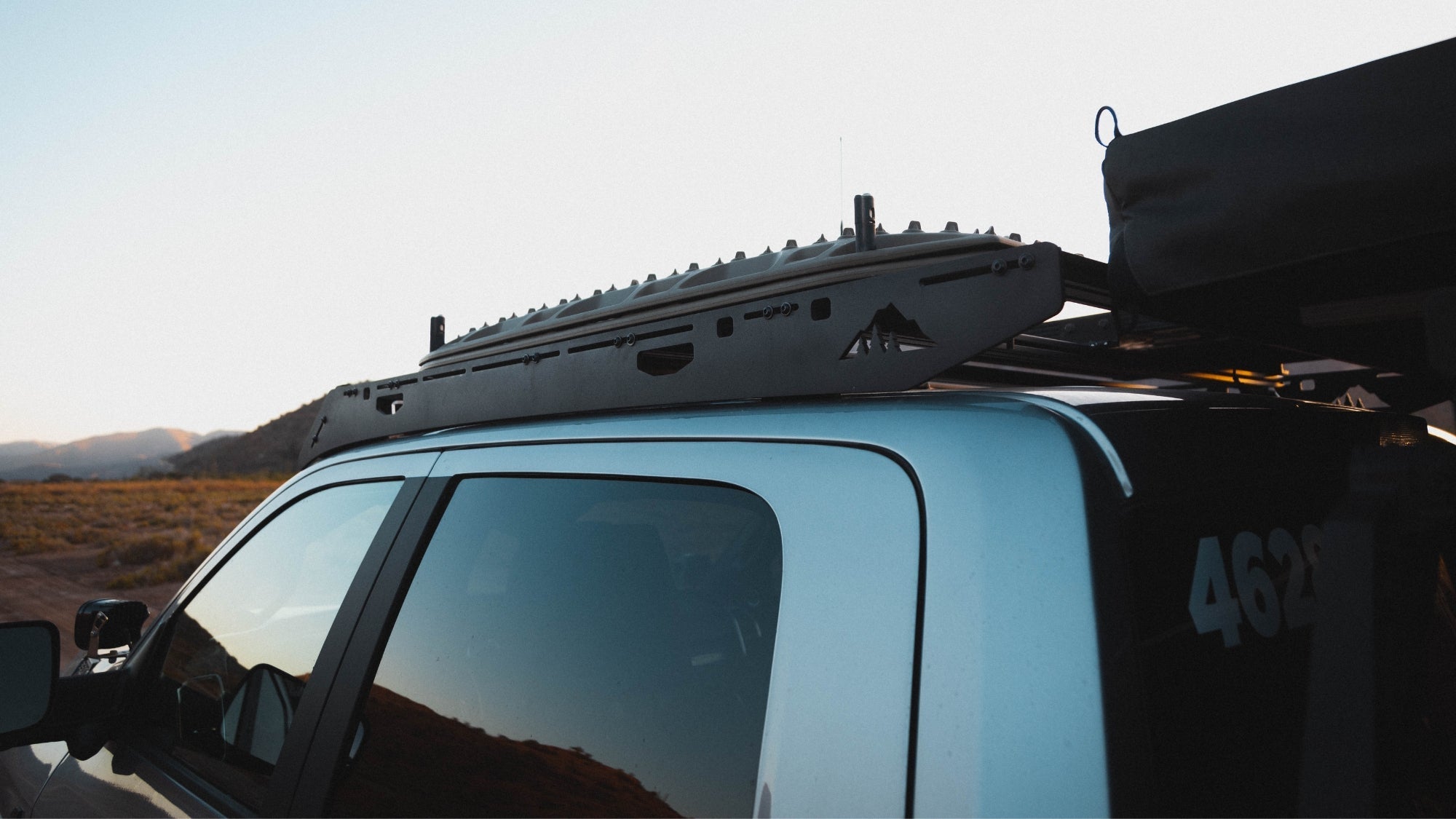 Ram Truck Roof Rack Rear corner eye-level view of rack on truck outside