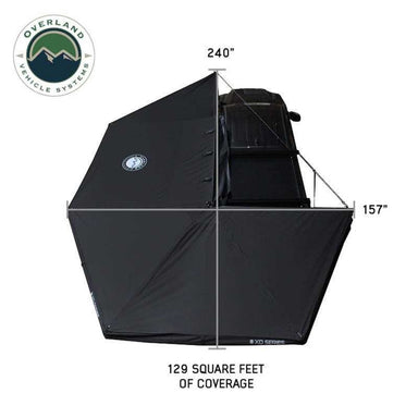 Overland Vehicle Systems XD Nomadic 270 Degree Awning & Wall Kit Combo with Lights, Black Out, Black Body , Trim, And Travel Cover top view assembled on white background