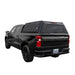 Overland Vehicle Systems "Expedition" Truck Cap with Full Wing Doors, Front And Rear Windows & 3rd Brake Light rear view on silverado