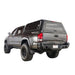 Overland Vehicle Systems "Expedition" Truck Cap with Full Wing Doors, Front And Rear Windows & 3rd Brake Light rear view on tacoma