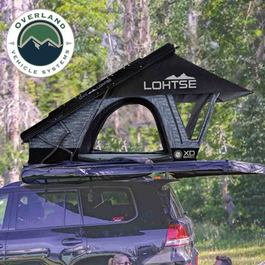 Overland Vehicle Systems XD Lohtse Clamshell Aluminum Hard Shell Roof Top Tent open tent installed on vehicle outdoors