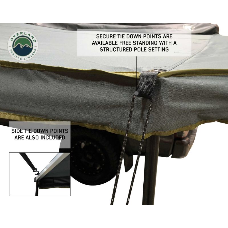 Overland Vehicle Systems Nomadic 270 LT Awning - Passenger Side - Dark Gray With Black Cover close up of tie down points  on white background