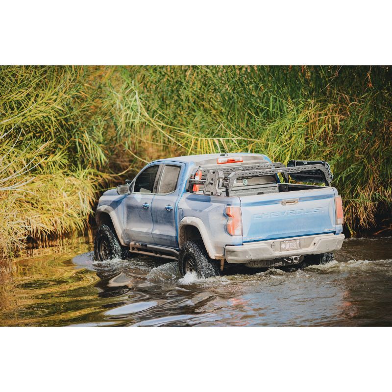 Chevy Colorado SHIPROCK Mid Rack System MIDRACK TUWA PRO®️ rear corner view installed on vehicle in water