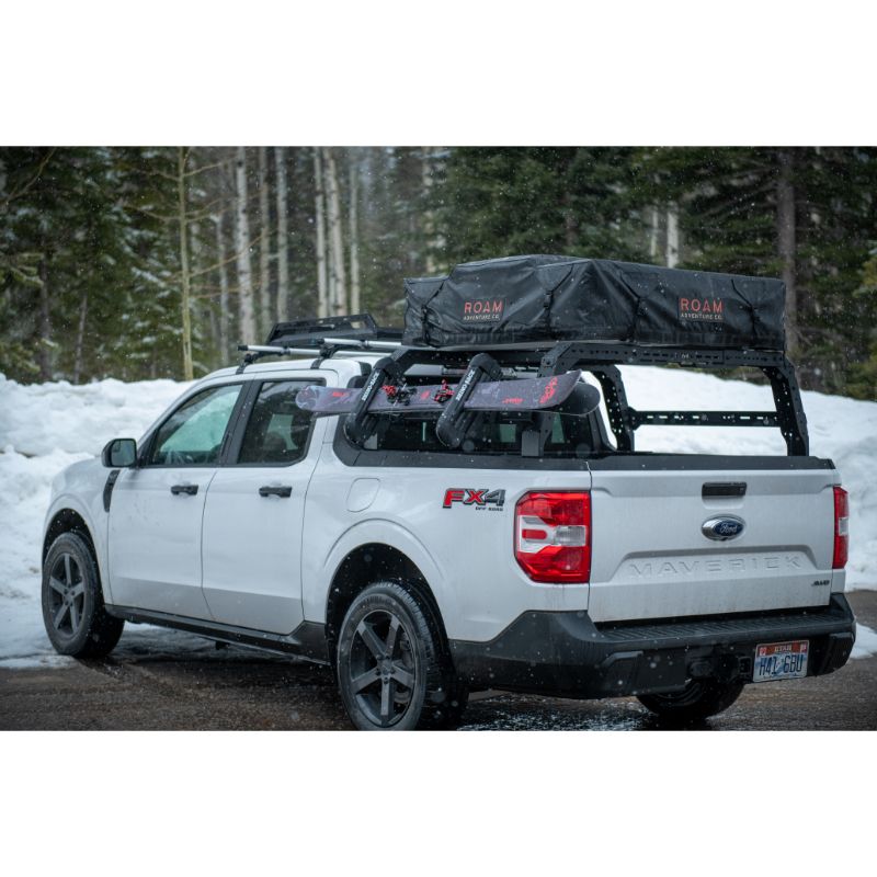 Ford Maverick 4CX Series Shiprock Height Adjustable Bed Rack Truck Bed Cargo Rack System TUWA PRO®️ rear corner view installed on vehicle in snow