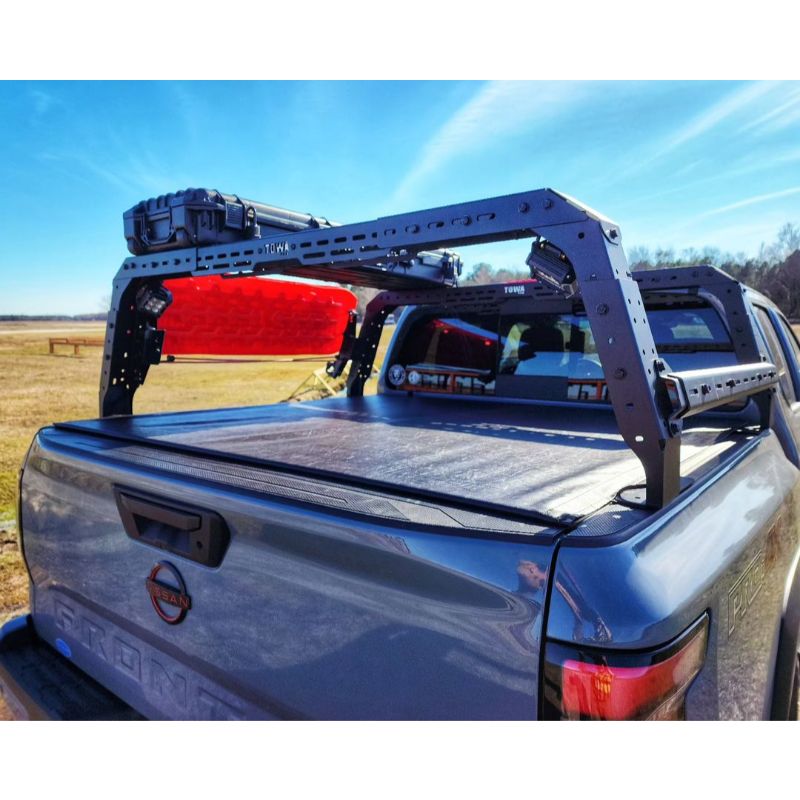 Nissan Frontier 4CX Series Shiprock Height Adjustable Bed Rack Truck Bed Cargo Rack System TUWA PRO®️ rear corner view installed outdoors