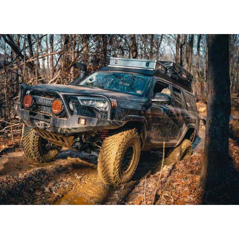 Backwoods Adventure Mods Hi-Lite Overland Front Bumper [Bull Bar] for Toyota 4Runner (5th Gen) Corner view of bumper attached to vehicle on trail