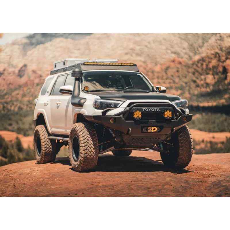 Backwoods Adventure Mods Hi-Lite Overland Front Bumper [PreRunner Bull Bar] for Toyota 4Runner (5th Gen) Corner view of bumper attached to vehicle on hill