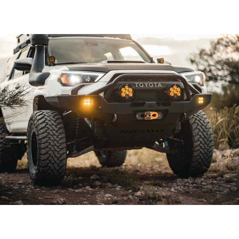 Backwoods Adventure Mods Hi-Lite Overland Front Bumper [PreRunner Bull Bar] for Toyota 4Runner (5th Gen) Front view of bumper attached to vehicle on trail