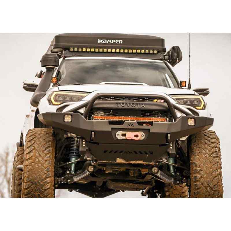 Backwoods Adventure Mods Hi-Lite Overland Front Bumper [PreRunner Bull Bar] for Toyota 4Runner (5th Gen) Front view of bumper attached to vehicle with camper in snow