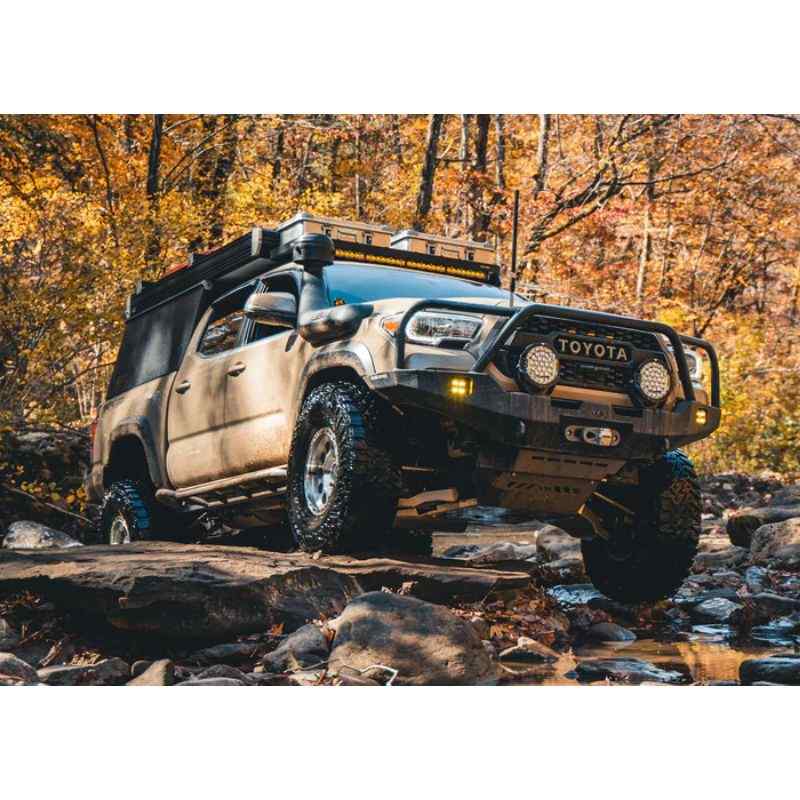 Backwoods Adventure Mods Hi-Lite Overland Front Bumper [Bull Bar] for Toyota Tacoma (3rd Gen) Bumper attached to Tacoma over rocks