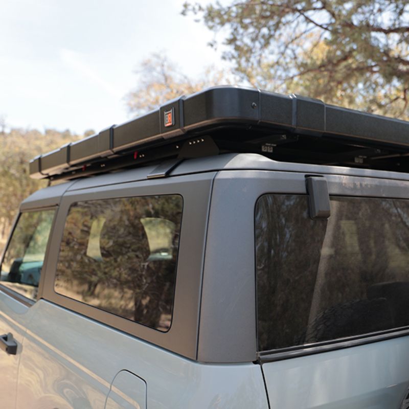 Badass Tents 2021-23 Ford Bronco 2 Door Roof Rack for Hardtop – NEW 2.0 ALL ALUMINUM. Rear eye level view of roof rack on vehicle outside