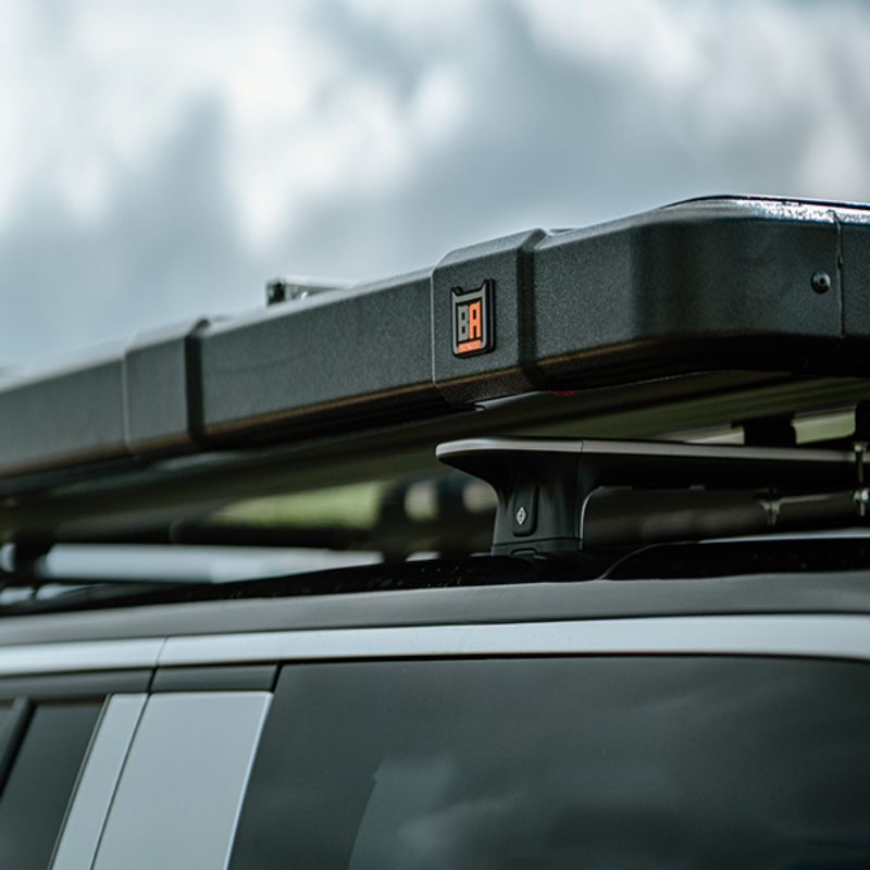 Badass Tents "RUGGED" Rooftop Tent (Universal Fit).Close up at eye level of corner of closed tent on vehicle