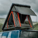 Badass Tents "RUGGED" Rooftop Tent (Universal Fit). Rear corner view of open tent on vehicle outside