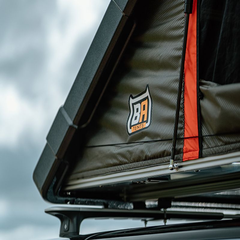 Badass Tents "RUGGED" Rooftop Tent (Universal Fit).Close up of tent corner with logo