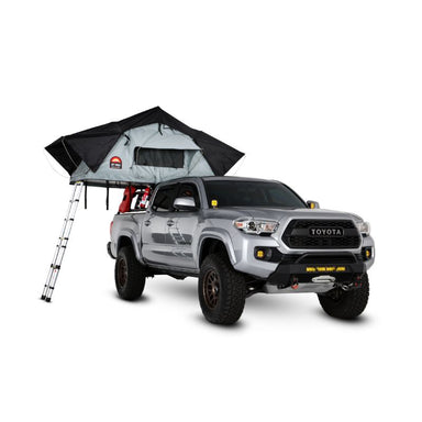 Body Armor 4X4 Sky Ridge Pike Soft Shell Rooftop Tent (2 Person). Open tent with cover and ladder on truck on white background