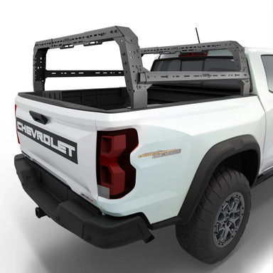 Chevy Colorado 4CX Series Shiprock Height Adjustable Bed Rack Truck Bed Cargo Rack System TUWA PRO®️ rear corner view installed on white background