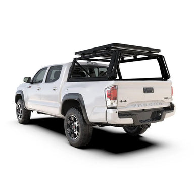 Front Runner Pro Bed Rack Kit for Toyota Tacoma Double Cab 5' (2005-2023) rear view on truck on white background