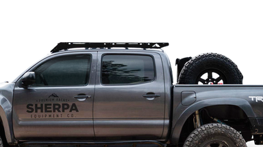 2nd/3rd Gen Tacoma Low Profile Roof Rack Closer side view of rack on truck on white background