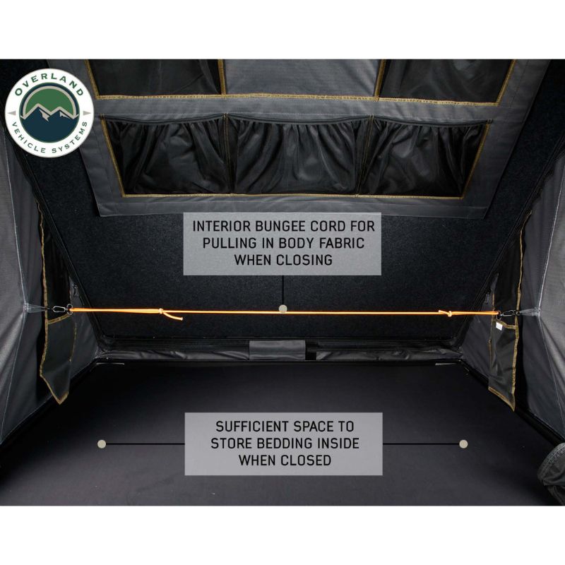 Overland Vehicle Systems Mamba III Hard Shell Roof Top Tent Interior view of bungee cord for closing