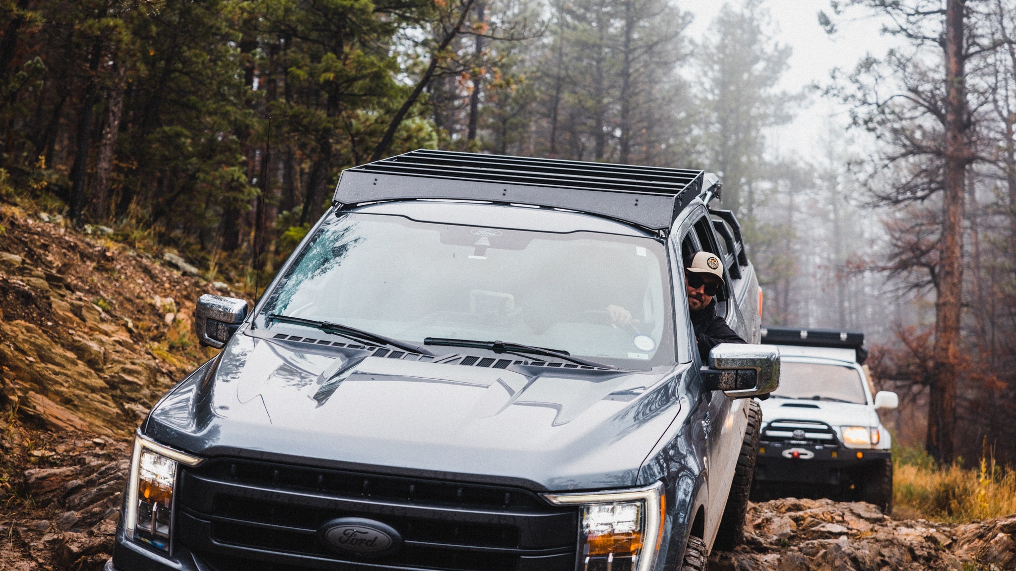 Ford F150 Roof Rack top front view of rack on vehicle outside showing crossbars