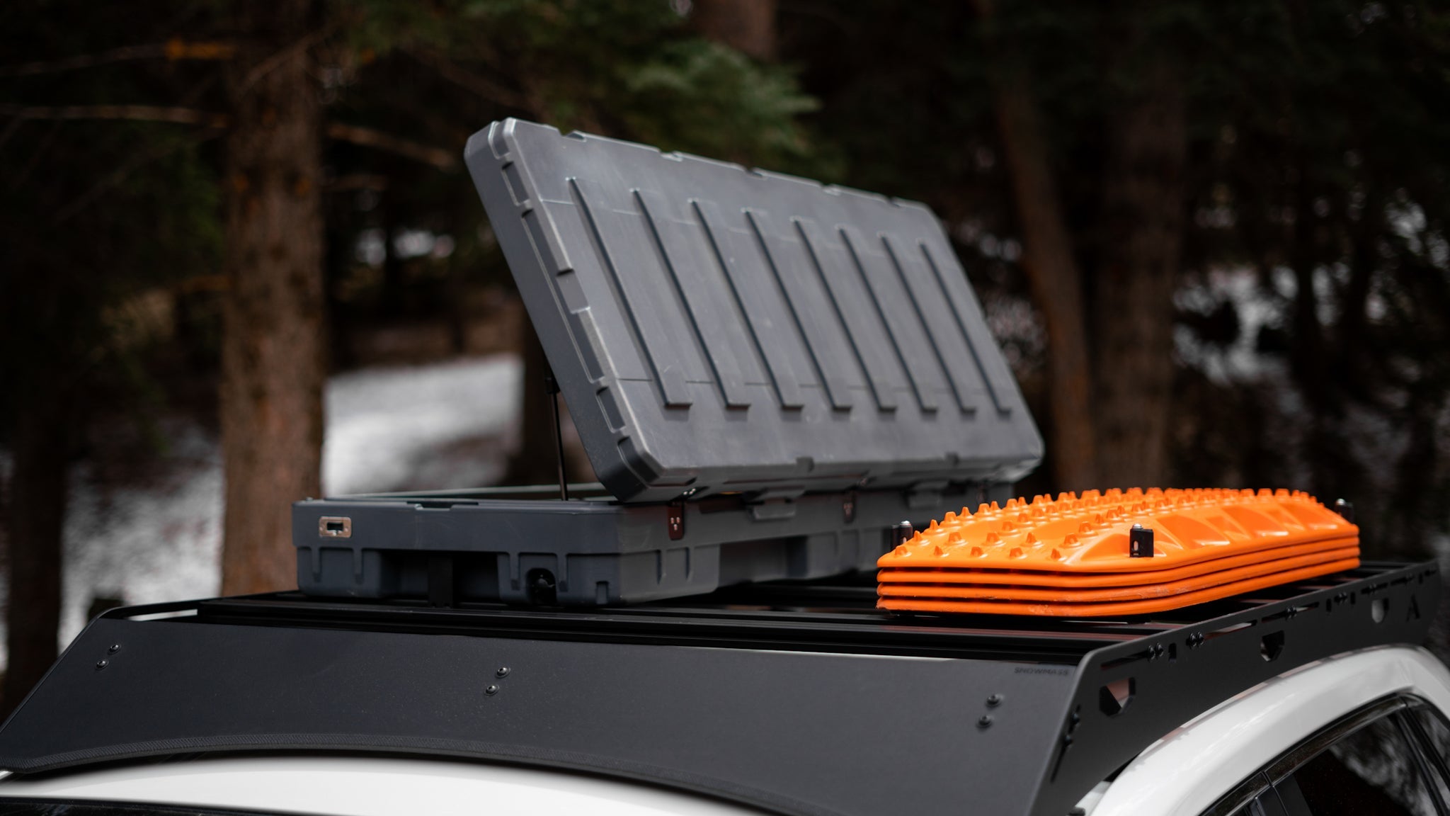 Toyota Rav4 Roof Rack Eye level front view of rack on vehicle with opened container on top
