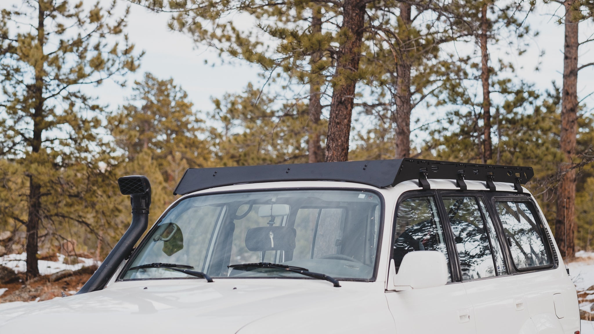 80 Series Landcruiser Roof Rack Eye level front view of rack on vehicle outside