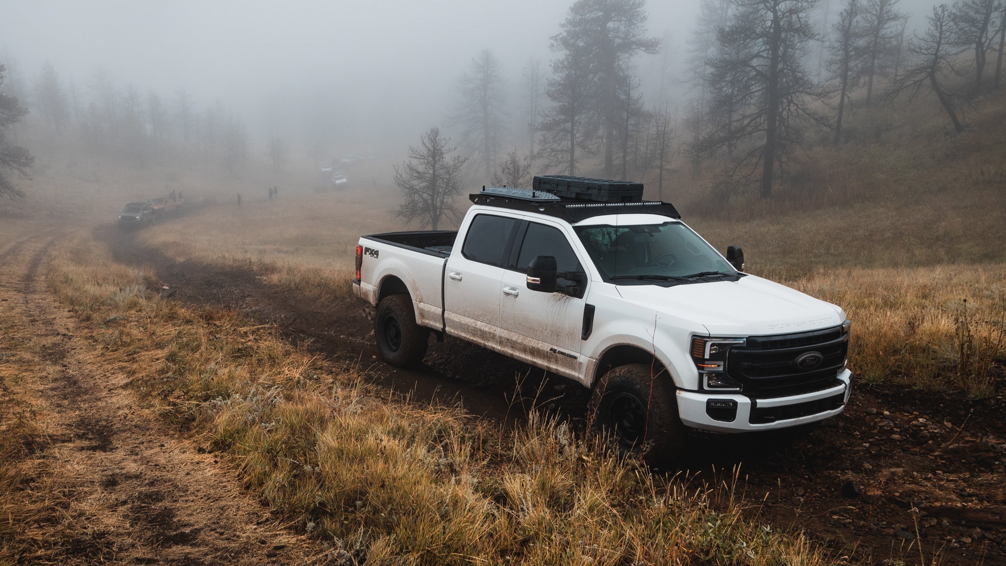 Ford F250/350/450/550 Roof Rack Wide angled view of rack on vehicle on trail