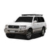 Front Runner Toyota Land Cruiser 100/Lexus LX470 Slimline II Roof Rack Kit Roof rack on vehicle on white background