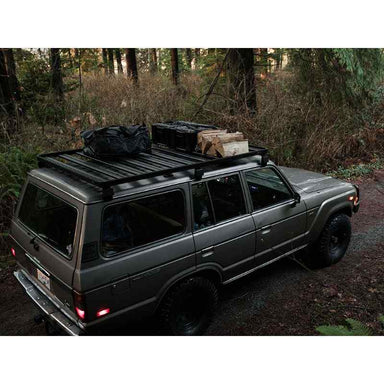 Front Runner Toyota Land Cruiser 60 Slimline II Roof Rack Kit Top view of roof rack on vehicle on trail