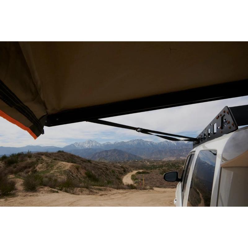 Tuff Stuff Overland 270 Degree Awning, Compact, Driver Side, C-Channel Aluminum, Olive open bottom view on vehicle outdoors