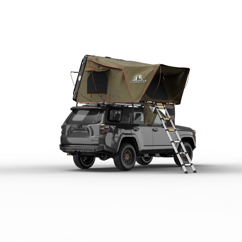 Tuff Stuff Overland Alpha Hard Shell Rooftop Side Open Tent (4 Person). Rear corner view of open tent with ladder on truck on white background