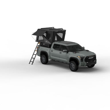 Tuff Stuff Overland Alpine 61 Hard Shell (Aluminum) Rooftop Tent. Open tent with ladder on vehicle on white background