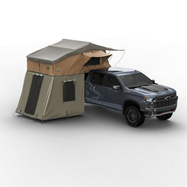 Tuff Stuff Overland Elite Soft Shell Rooftop Tent & Annex Room (5 Person). Open tent and open annex on vehicle on white background