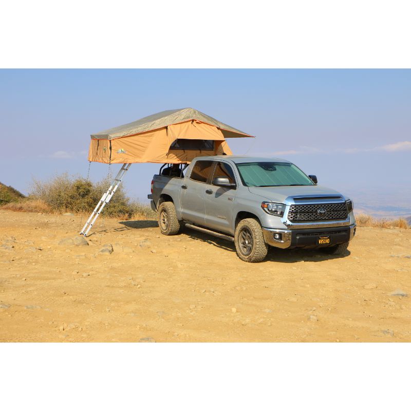 Tuff Stuff Overland Ranger Soft Shell Rooftop Tent (3 Person). Front view of open tent on vehicle with ladder