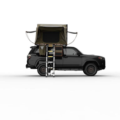 Tuff Stuff Overland Stealth Black Ops Series Hard Shell (Aluminum) Rooftop Tent. Side view of open tent with ladder on truck on white background