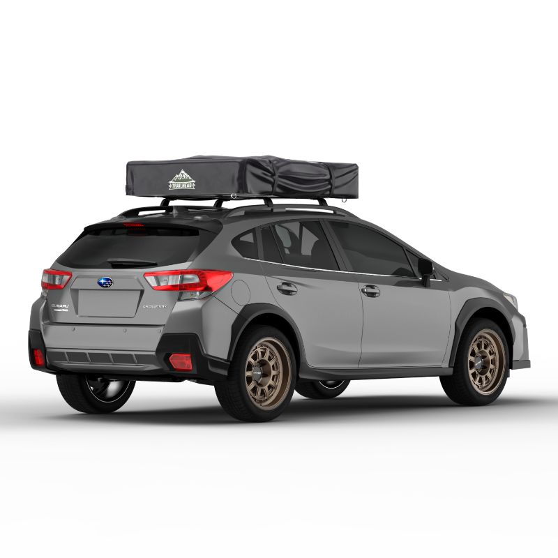 Tuff Stuff Overland Trailhead Soft Shell Rooftop Tent (2 Person). Rear view of closed tent on vehicle on white background