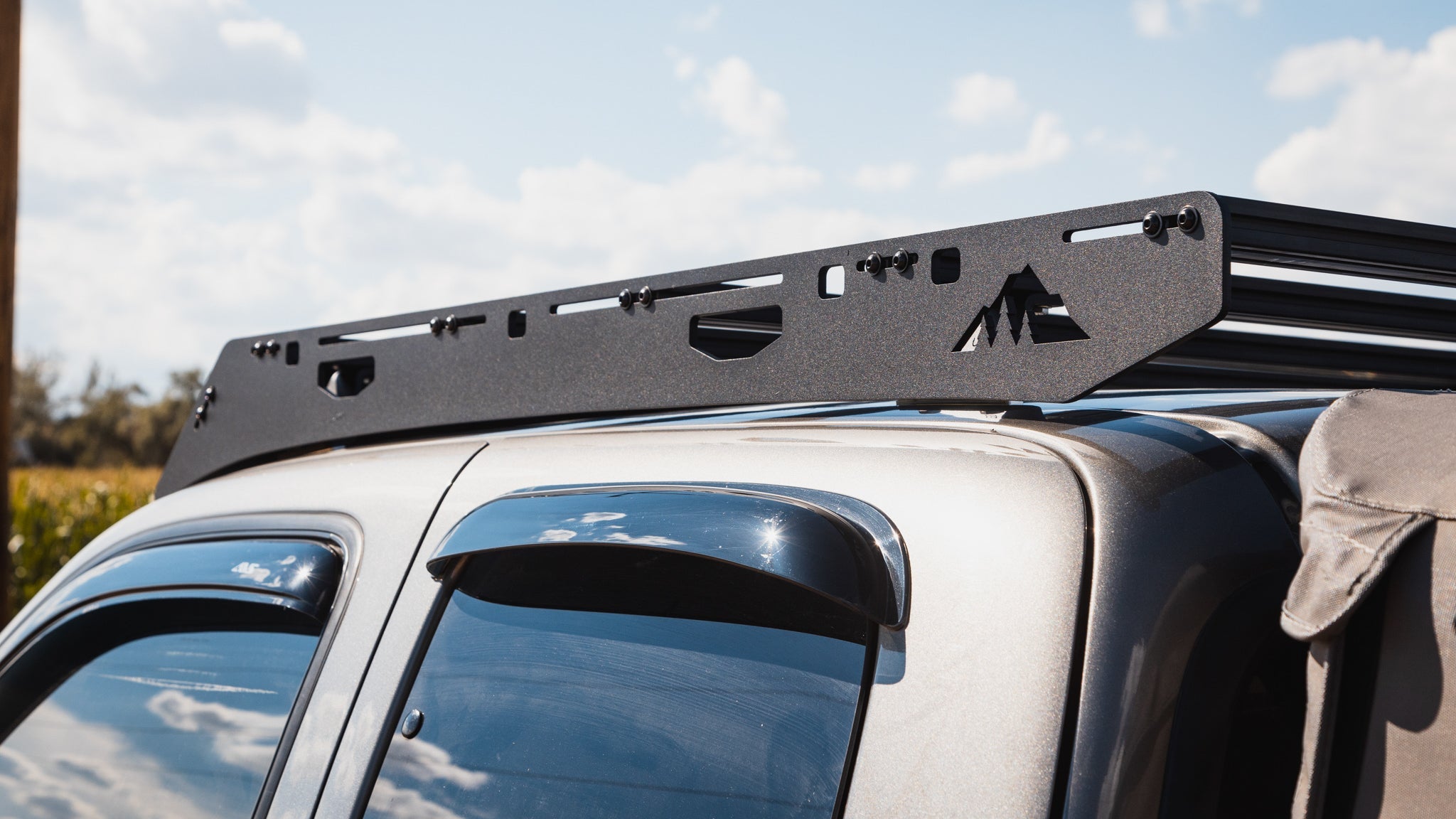 1st Gen Toyota Tundra Roof Rack Close up side view of rack on vehicle outside