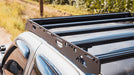 1st Gen Toyota Tundra Roof Rack Close up top view of rack on vehicle outside showing crossbars and finish