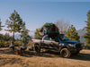 Rev Platform x SCOUT DESERT FOREST on truck with ladder and people at campsite