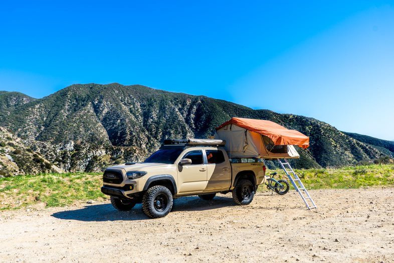 on truck at campsite Trustmade Wander Series - Standard Size Soft Shell Rooftop Tent-Soft Shell Rooftop Tent-Trustmade-Car Camp Pro