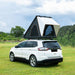 Trustmade Scout Series - Triangular Hard Shell Rooftop Tent open on suv on grass rear