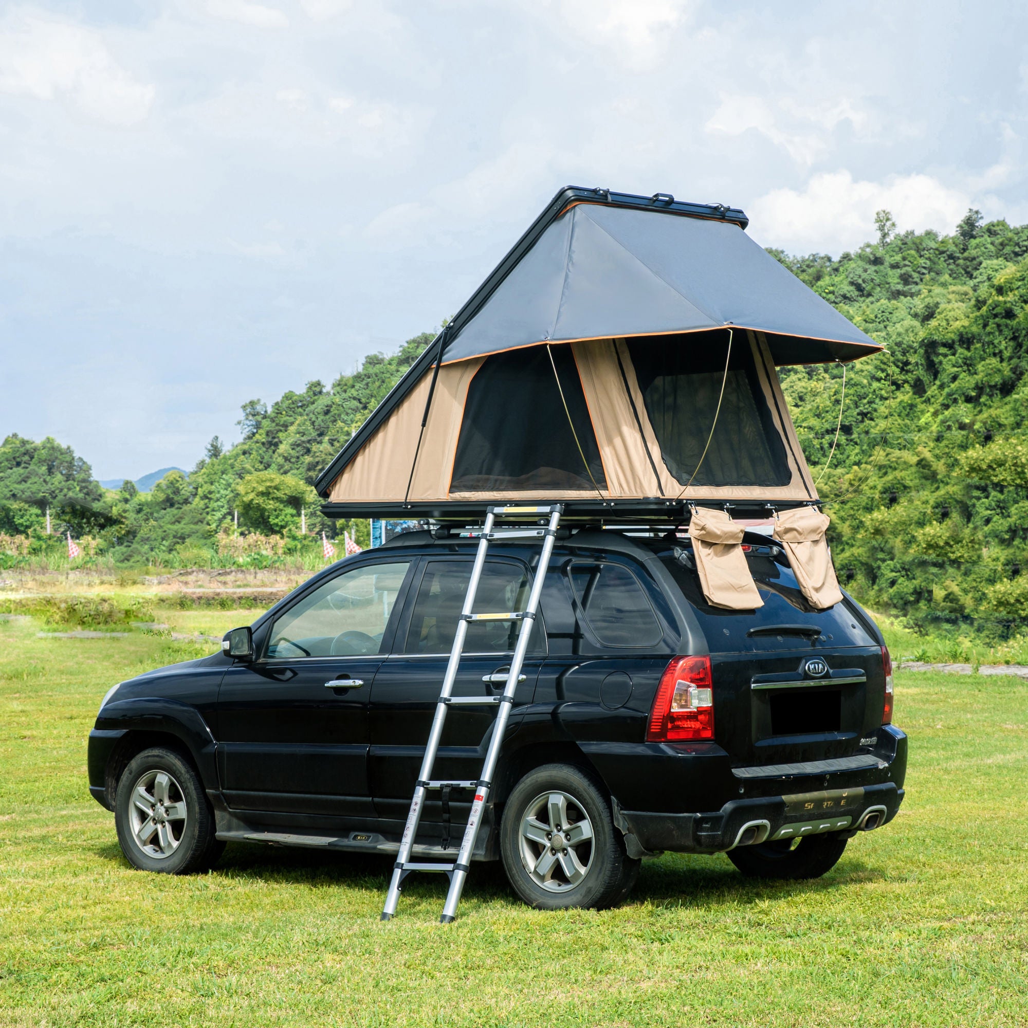 Trustmade Scout MAX Series - Triangular Hard Shell Rooftop Tent assembled on suv with ladder outside